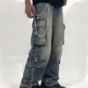 Washed denim wide leg cargo pants with utility pockets and relaxed streetwear fit.